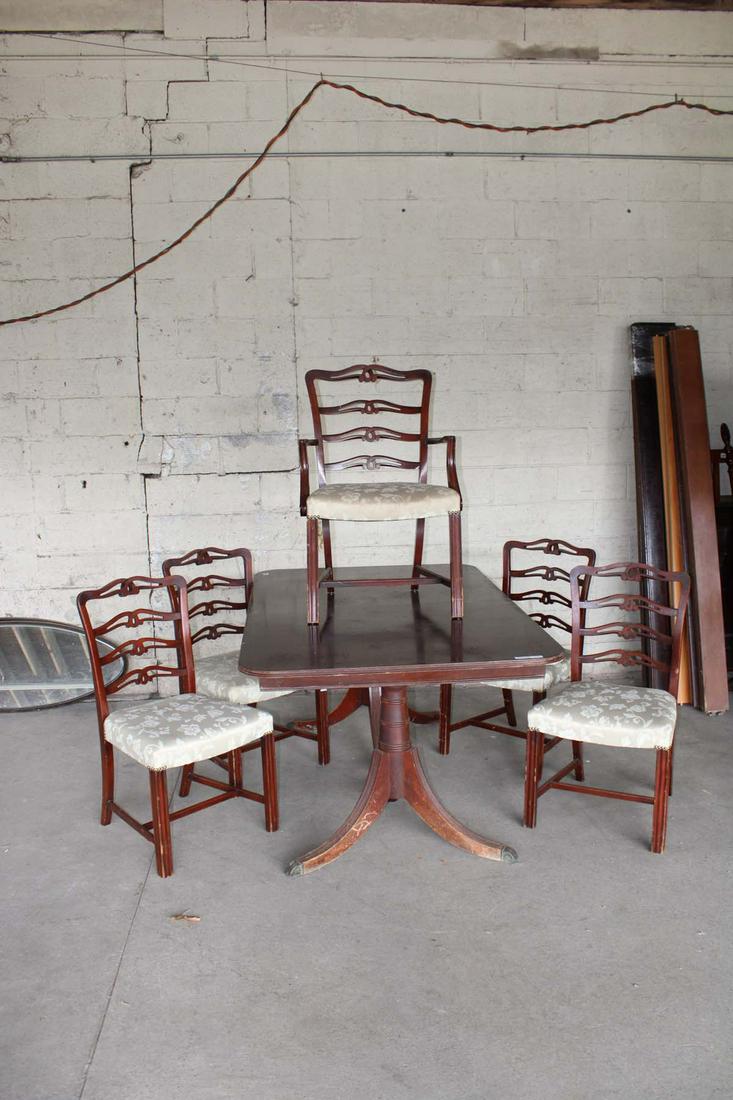 Vintage 6pc dining room table and 5 chairs: Vintage mahogany 6pc dining room table and 5 chairs, some finish issues approx. Table: 66" w x 42" d x 30" h Arm Chair: 24" w x 24" d x 38" h Side Chairs: 20" w x 20" d x 37" h seat height 18"