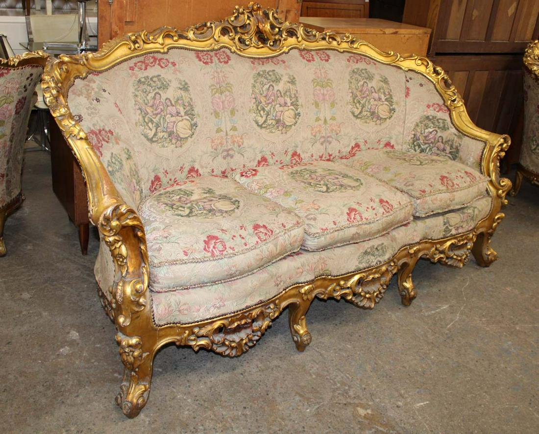 Highly carved ornate gold gilt parlor sofa: French style highly carved and ornate gold gilt parlor sofa with French style embroidery approx. 84" w x 36" d x 48" h seat height 21"