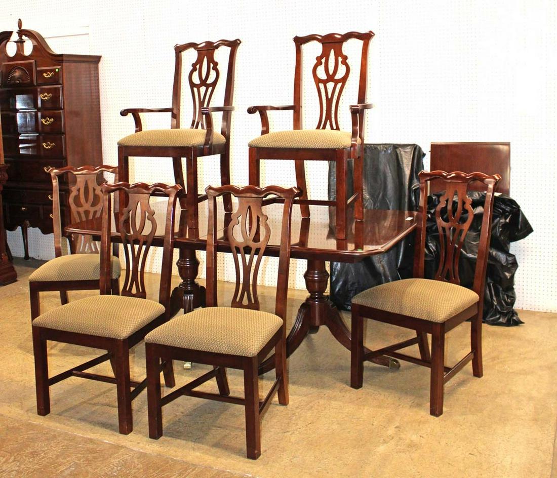 Beautiful 7pc mahogany dining room table with 6 chairs: Beautiful 7pc cherry dining room table with 6 chairs and 2 leaves, believed to be Thomasville approx. Table: 72" w x 44" d x 30" h each leaf 20" Arm Chairs: 24" w x 19" d x 41" h Side Chairs: 19" w x