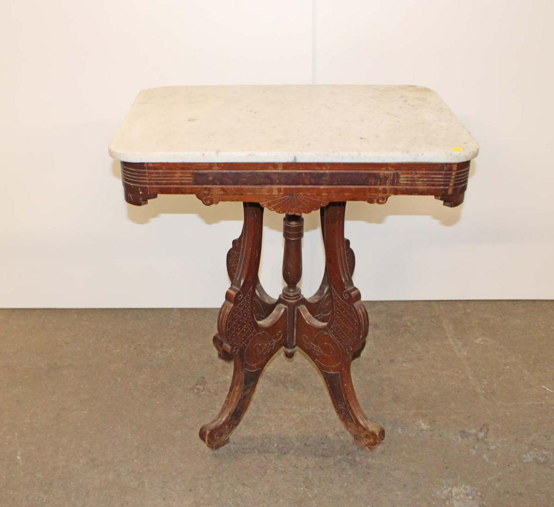 Antique Victorian walnut marble top parlor table approx. 27" w x 20" d x 29" h: Antique Victorian walnut marble top parlor table approx. 27" w x 20" d x 29" h
