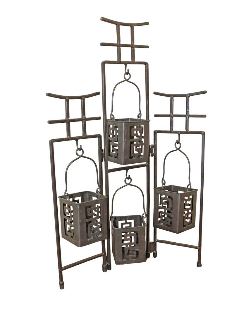 Asian decorator metal candle holder approx. 12" w x 21" h: Asian decorator metal candle holder approx. 12" w x 21" h