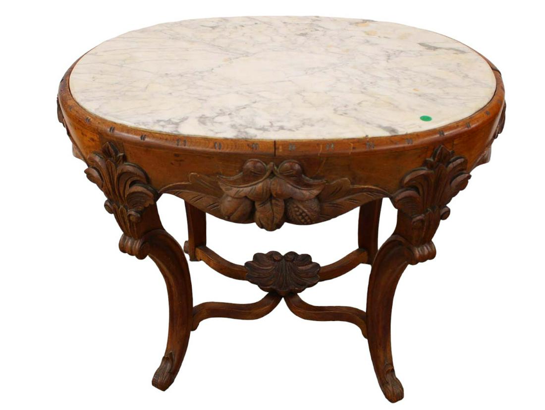 Antique highly carved oval marble top Victorian parlor table in the oak and walnut woods with shell (1 of 4)