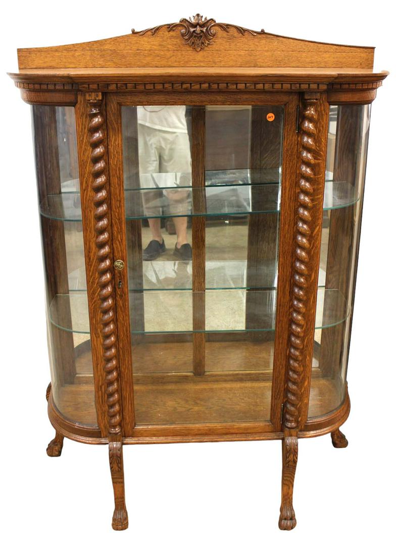 Antique oak curio crystal cabinet curved & glass shelved, mirror back. carved back splash, paw feetf (1 of 5)