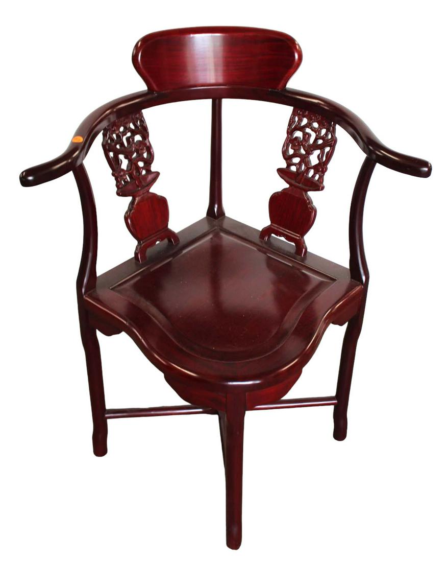 Asian hard wood carved corner chair: Asian hard wood carved corner chair, structurally sound and in good condition, 27"w x 21"d x 33"h and seat height of 17"