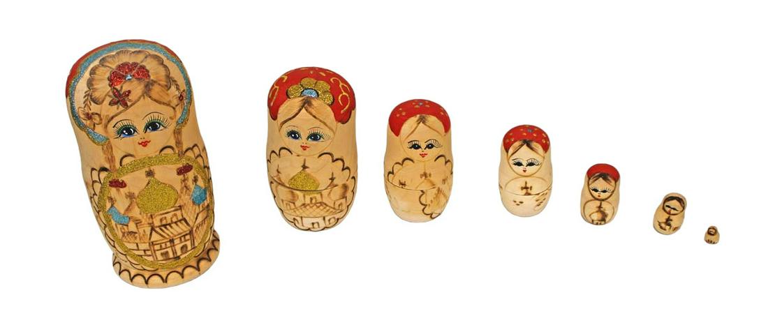 Asian wooden stackable nesting dolls, smallest 1/2"h, largest 8"h (1 of 3)