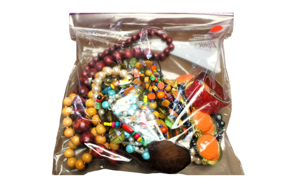 12" x 12" plastic bag loaded with costume jewelry (1 of 2)