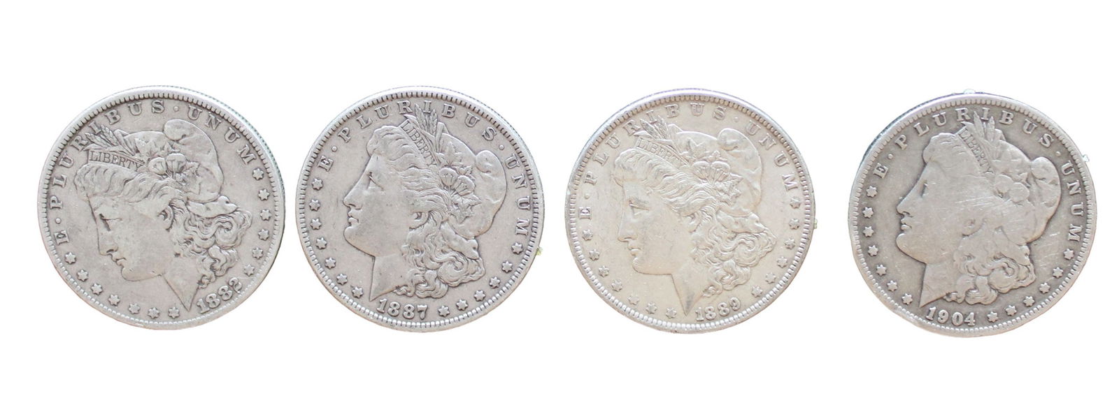 4 US Morgan silver dollars 1904-0, 1882, 1883, 1887 (1 of 3)