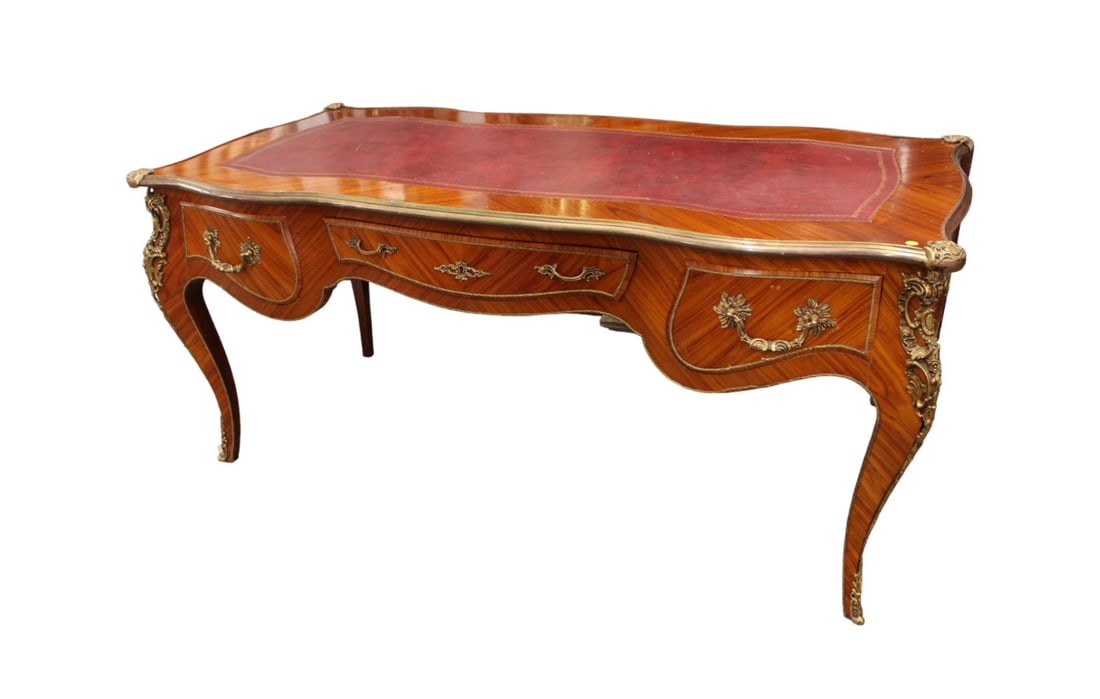French style treaty desk with leather top and heavily carved bronzes in the satinwood, three drawers (1 of 8)