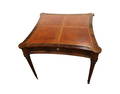 Beautiful game table in the manner of Maitland Smith, rosewood, leather, fluted leg