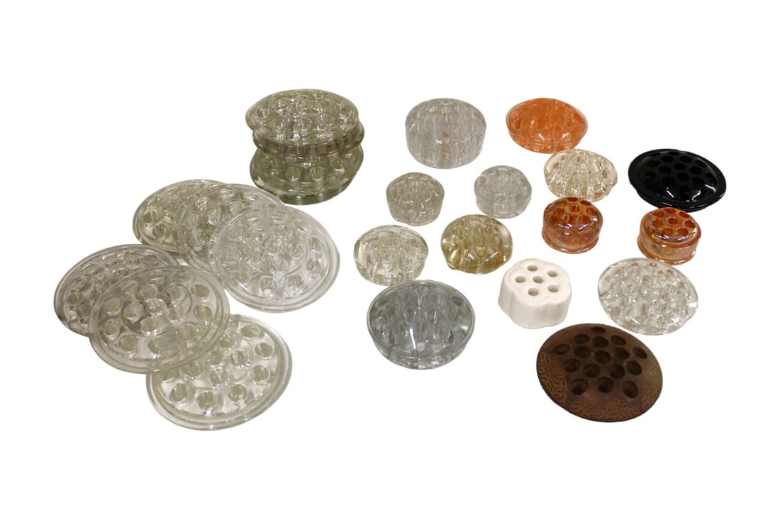 Collection of 24 semi antique glass flower frogs (1 of 2)