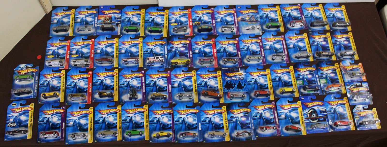 56 Hot Wheels mixed series, 55 pkgs. unopened (1 of 4)
