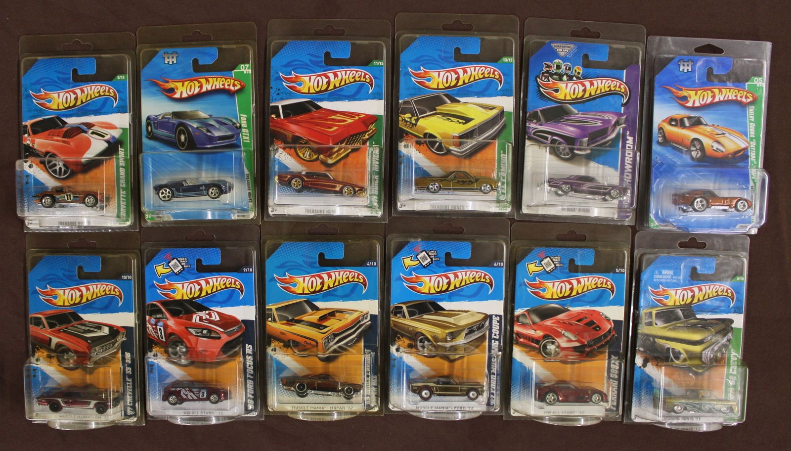 12 Hot Wheels in hard plastic cases, unopened: 12 Hot Wheels in hard plastic cases, unopened