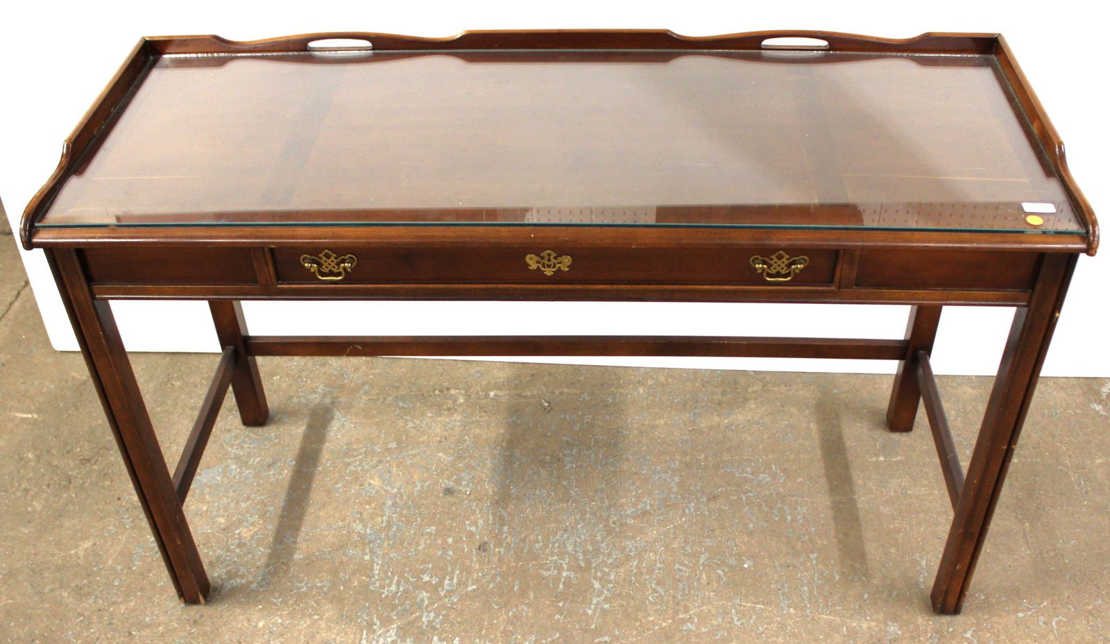 Lane Desk in the Pecan Mahogany Finish: Lane 1 drawer desk, pecan mahogany finish with custom glass top, structurally sound and in good condition, 52"w x 21"d x 31"h