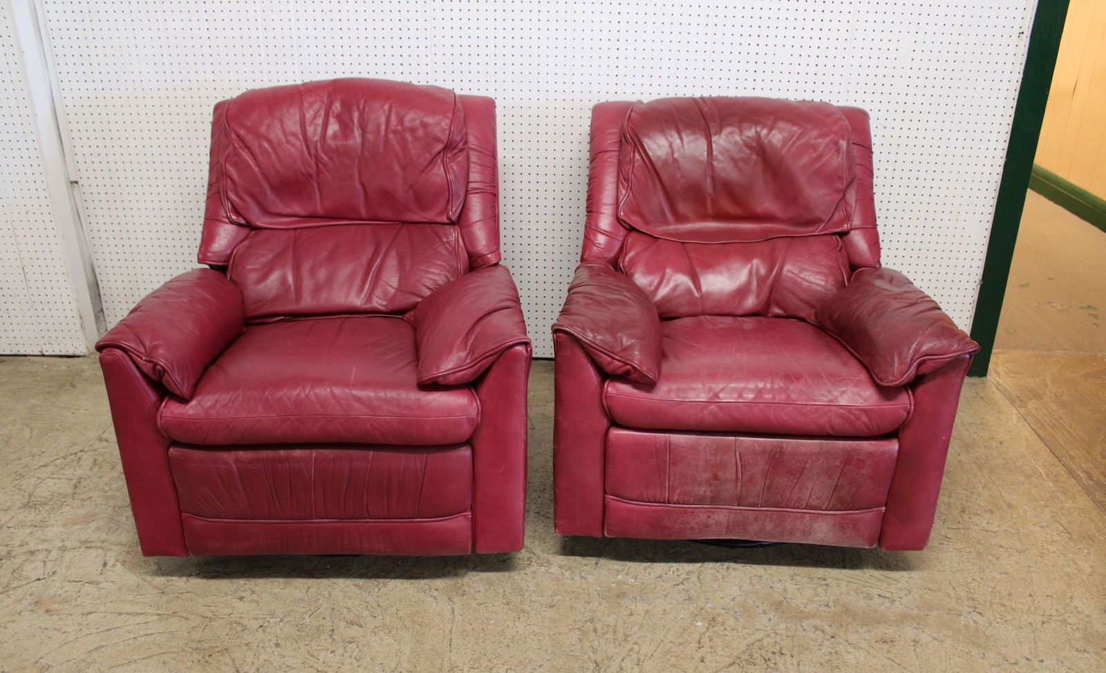 Quality Pair Red Leather Swivel Rocker Recliners: Pair of Quality Red Leather swivel rocker recliners, structurally sound, shows patina and wear, recliner mechanisms are stiff, comfy when open though, 34"w x 34"d x 37"h with seat height of 20"