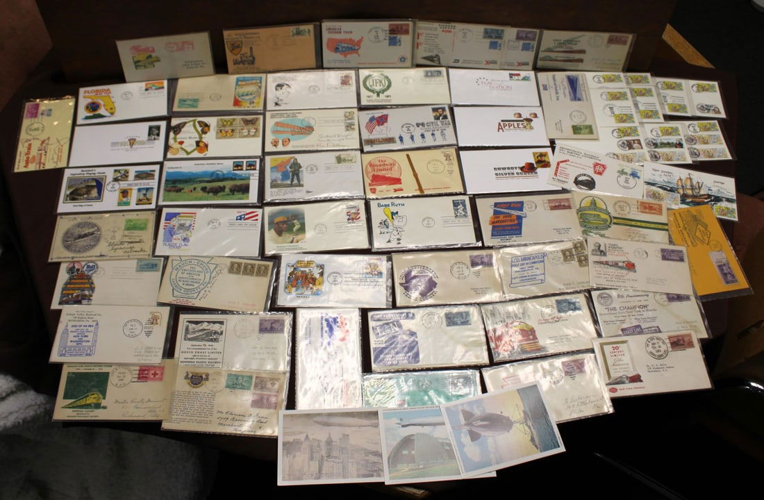 50+ post cards with collectible stamp including 13 first day issues, various years in plastic (1 of 11)