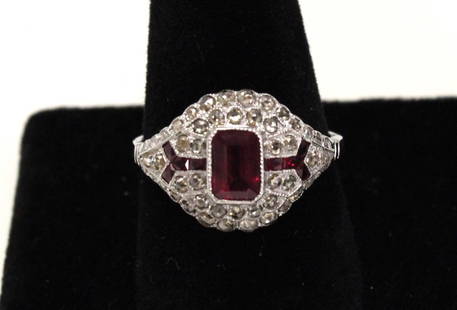 1.0ct Ruby / diamonds in 14kt white gold: 1.0ct Ruby and .32ctw diamonds in 14kt white gold, approx. size 7