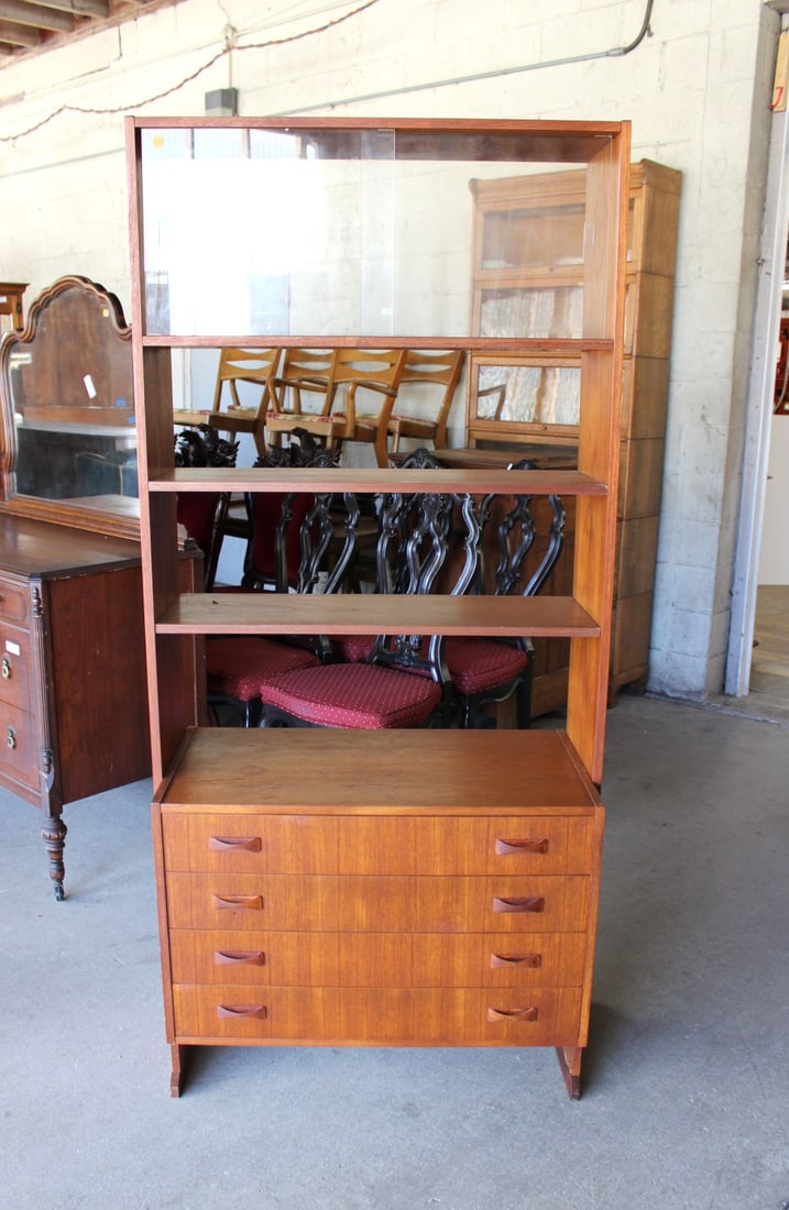 Mid C. Teak 3 tier chest with sliding door bookcase top: Mid Century Teak 4 drawer 3 tier chest with sliding door bookcase top, structurally sound but a little loose, believe needs tightening, 33"w x 17"d x 73"h