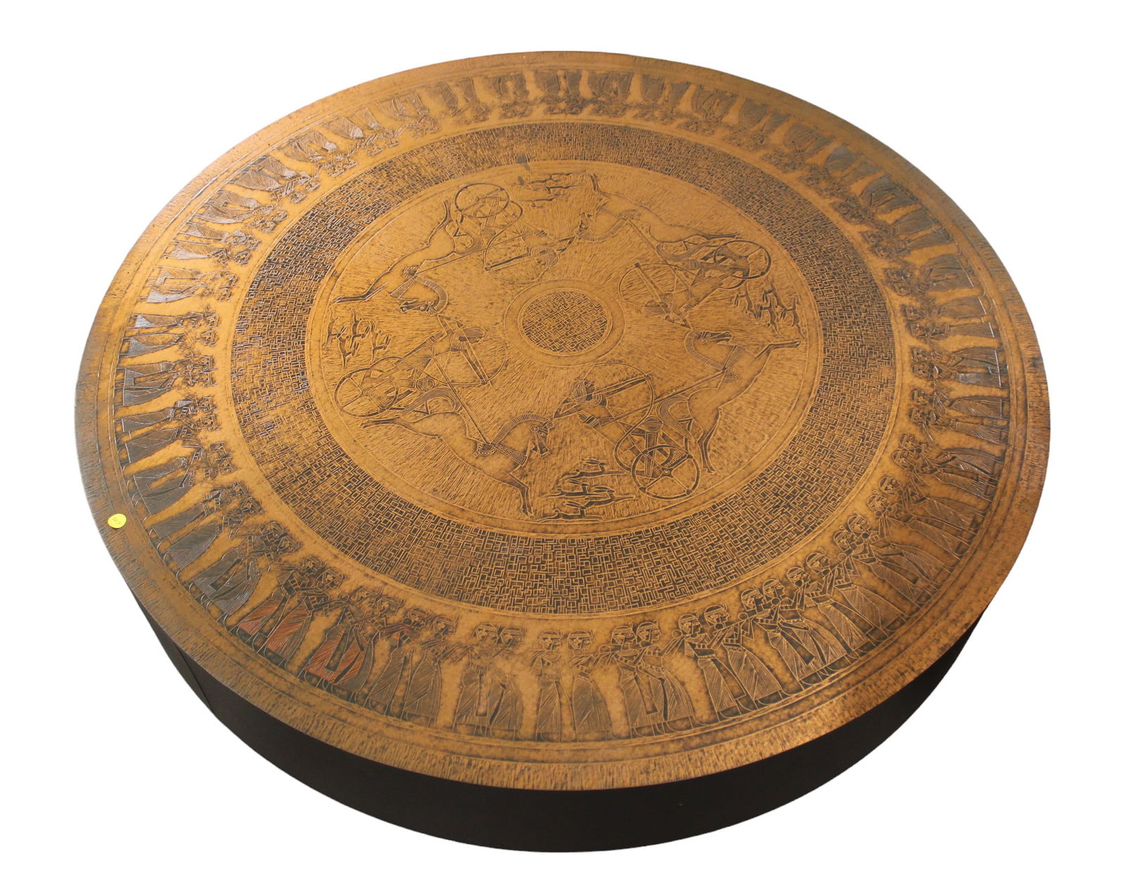 MidC copper toned top 46 inch round coffee table with Egyptian chariots & woman on black base, (1 of 6)