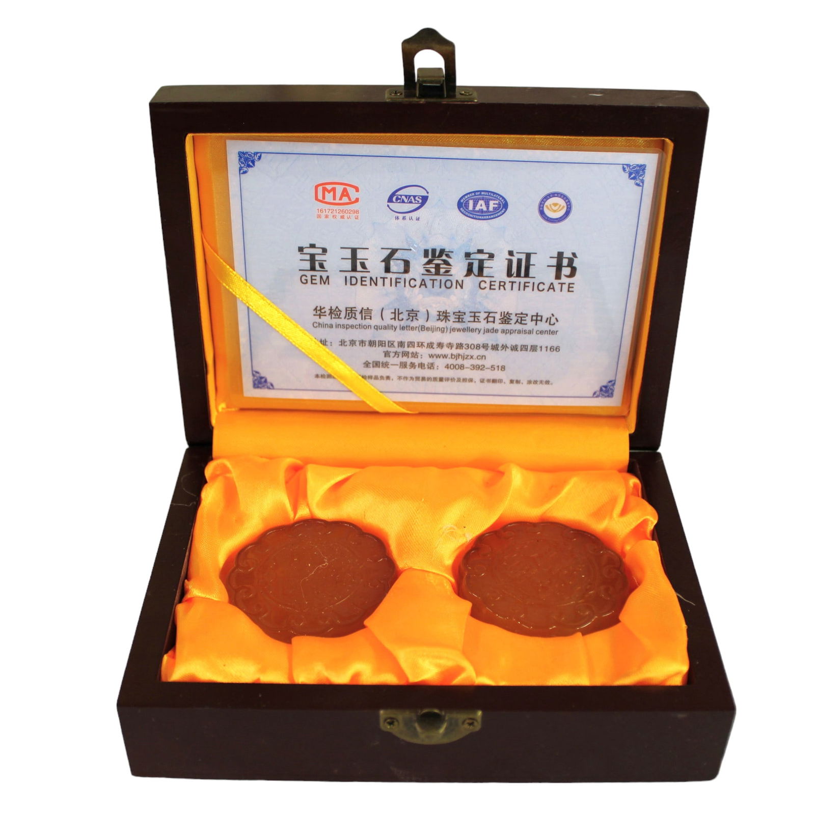 Chinese pair of carved biscuit gems in mahogany wooden box, each 2" diameter, box 6 1/2 l x 5" d x 2: Chinese pair of carved biscuit gems in mahogany wooden box, each 2" diameter, box 6 1/2 l x 5" d x 2" h