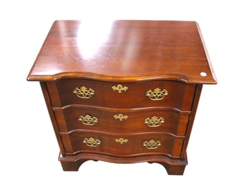 Solid cherry serpentine front 3 drawer night stand