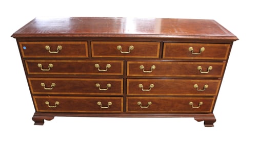 Thomasville 9 drawer low chest, burl mahogany and banded