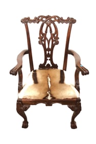 Solid Mahogany Chippendale style arm chair with animal fur seat