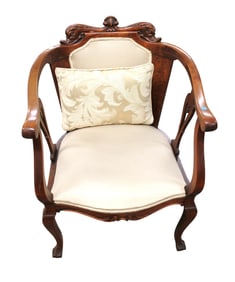Antique mahogany carved arm chair