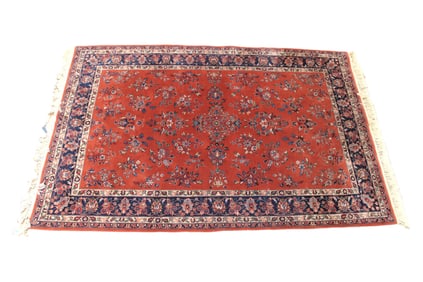 Hand stitched 6x9 rug in the red and blue