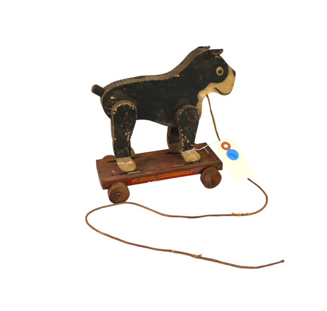 Antique Frantz dog pull toy with string: Antique Frantz pull toy with wooden dog body on metal frame, made in USA, original paint, believe to be original string