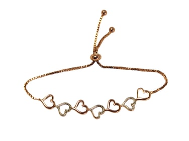 Diamond bracelet and rose gold over sterling silver, approx. 8"