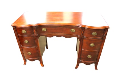 Vintage kneehole vanity / desk in the mahogany