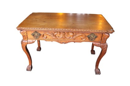 Antique solid quartersawn oak desk, highly carved paw foot
