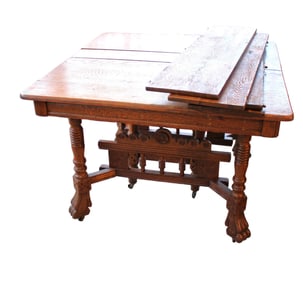 Antique oak breakfast table, carved base, (4) 10" original leaves
