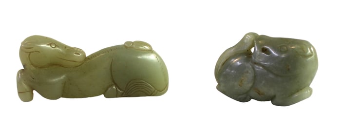 Pair of jade carved animals, does show age. Approx. 3"l and 2"l