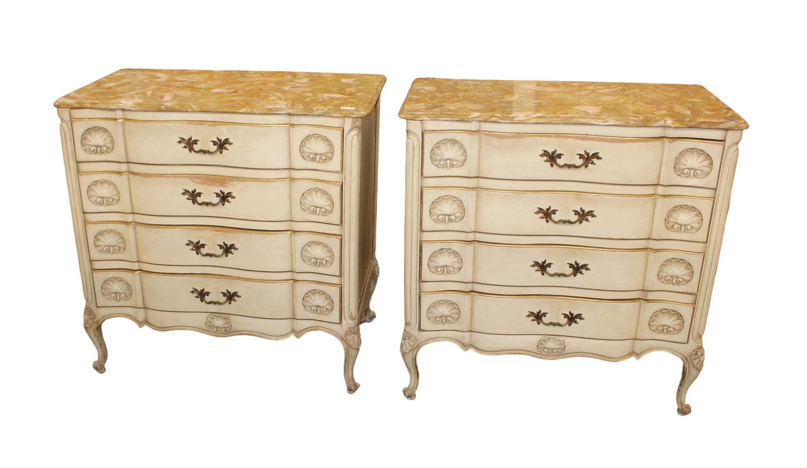Pair of Danby onyx top decorator chests: Pair of Danby Furniture 4 drawer shell carved French style distressed painted and solid wood construction, serpentine with onyx top decorator chest. Structurally sound and in good condition, one onyx 