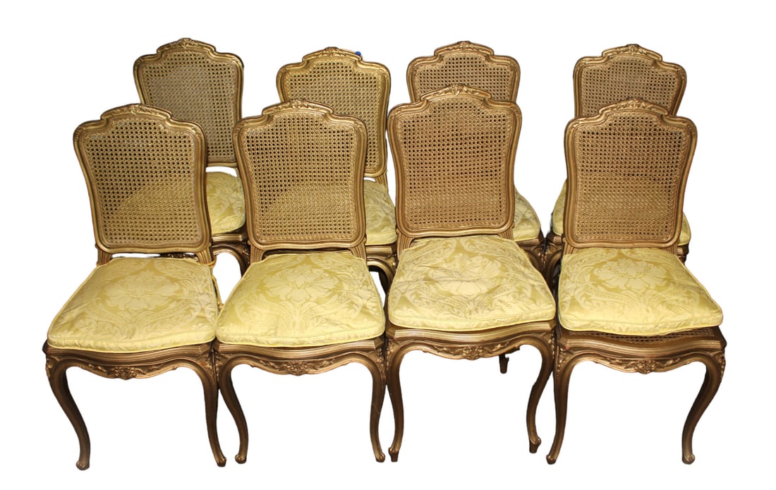 Set 8 French style music chairs in the gold paint: Set of 8 carved French style music chairs in the gold paint with cane seats which are good. Solid wood construction. With removeable cushions. Seat height of 18" Each: