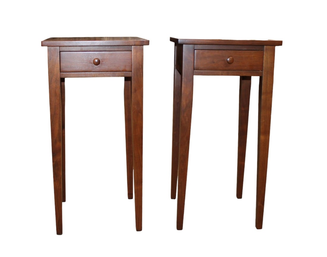 Quality pair bench made walnut side tables: Pair of quality bench made one drawer walnut tapered leg side tables. Dovetail construction. Solid wood. Structurally sound and in good condition. No noticeable issues seen. No name found. 30"h x 15"w