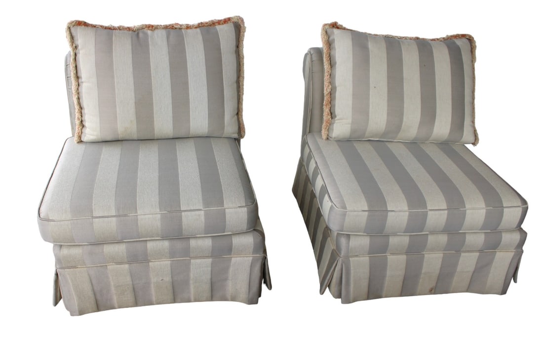 Pair of upholstered lounge chairs: Pair of upholstered lounge chairs. Structurally sound, upholstery needs cleaned. 32"h x 30"w x 38"d seat height 18"