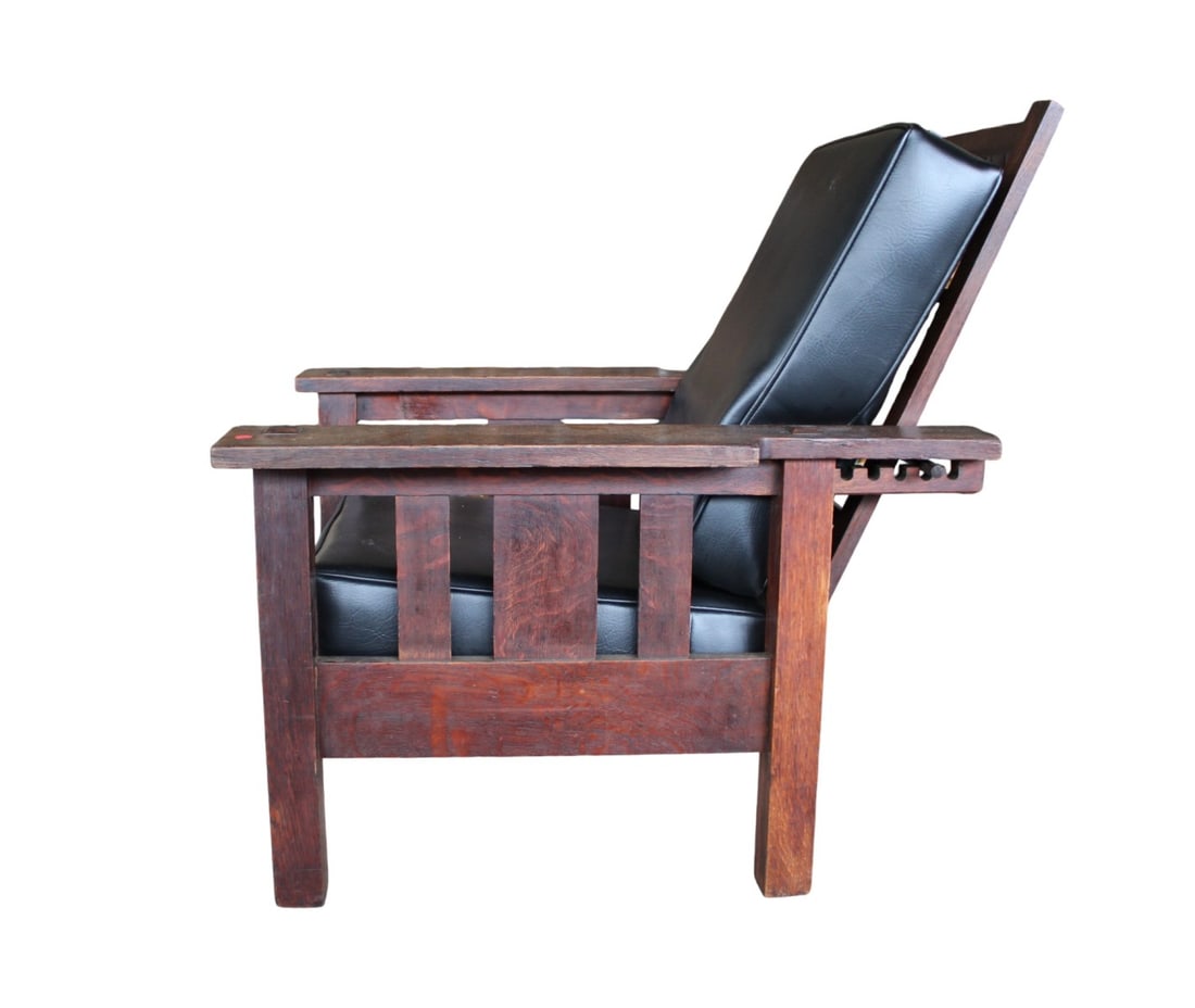 Antique mission oak morris chair manner of Stickley: Antique mission oak morris chair in the manner of Stickley seems to have been refinished over the years no marking found. Leather style cushions. Structurally sound and in good condition for age. 40"h