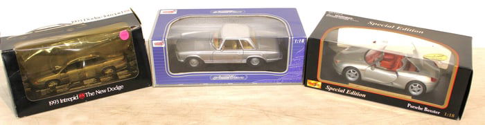 3 Diecast Cars: Anson Classic 1/18, Maisto 1/18 Porsche Boxster, 1993 Dodge Intrepid in original