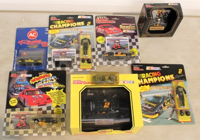 8 assorted items Nascar cars, action figures, Rusty Wallace and other in unopened boxes