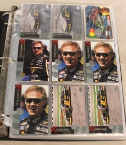 Photo album filled with race car Upper Deck and others