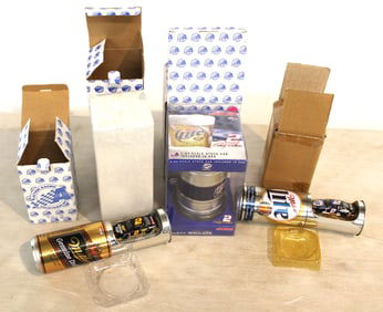 lot 4: Action  Racing 1/64 scale car in Keg, 2002 Taurus bottle with car, 1991 Grand prix can with