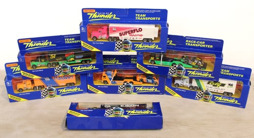 7 Matchbox Days of Thunder Race Car Transporters in original boxes - unopened