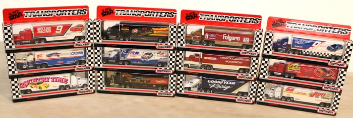 12 Matchbox Super Stars Transporters in unopened original boxes one autographed by Bobby Hamilton