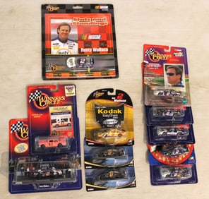 11 Winner Circle Collectible Cars some with cards and other in unopened original boxes