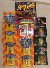 12 Looney Tunes Ertl, E.T.  Spiderman, Action Figures and other in original packages