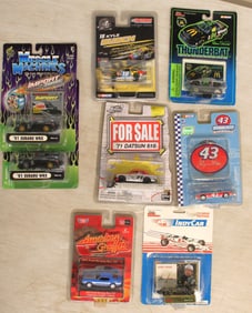 8 assorted Muscle Machines, Jada, Action Racing, Racing Champions and other in unopened original