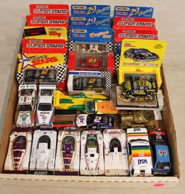 31 assorted die cast collectibles: Matchbox, Racing Champions and other, some in unopened original