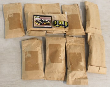 10 Matchbox Nascar packages with cards and cars 8 unopened